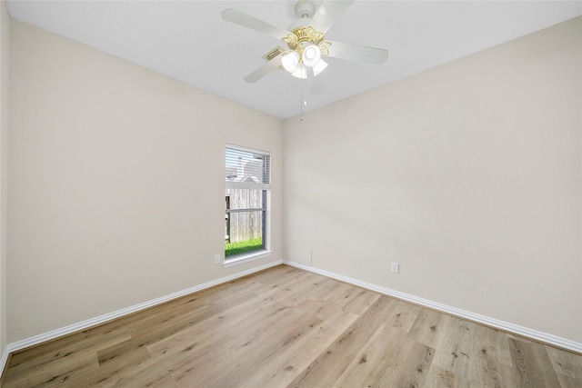 3106 Rainbow Ct, Pearland, TX 77584 - unfurnished room with light wood-style floors and a ceiling fan