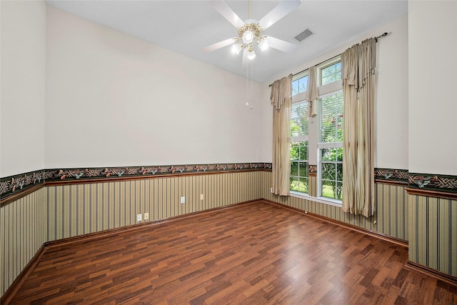 3106 Rainbow Ct, Pearland, TX 77584 - unfurnished room featuring wainscoting, wood finished floors, a ceiling fan, and lofted ceiling