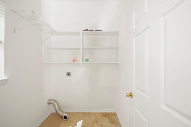 3106 Rainbow Ct, Pearland, TX 77584 - laundry room with electric dryer hookup and tile patterned flooring