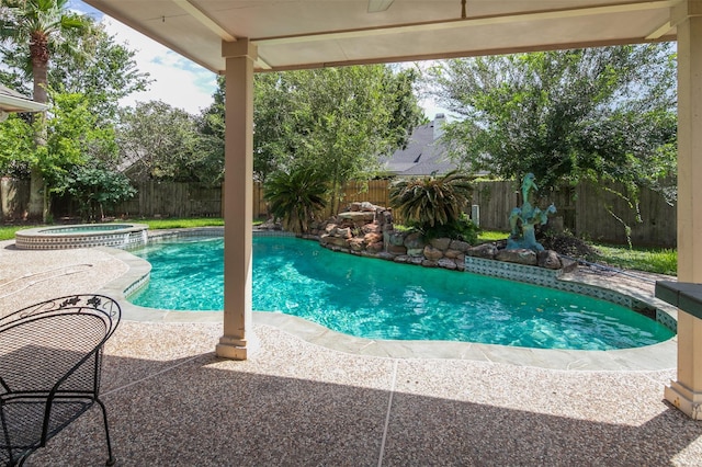 3106 Rainbow Ct, Pearland, TX 77584 - view of pool featuring a fenced backyard, a patio, and a pool with connected hot tub