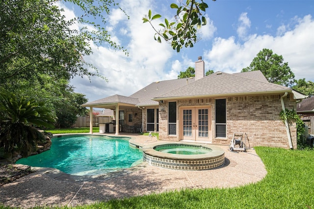 3106 Rainbow Ct, Pearland, TX 77584 - view of pool with an in-ground hot tub, french doors, and a patio
