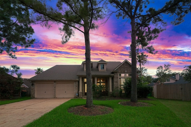 3106 Rainbow Ct, Pearland, TX 77584 - view of front of house with a garage, driveway, and stone siding