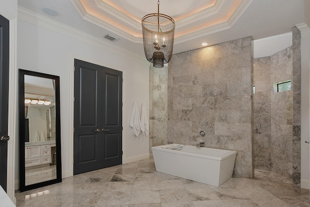 227 Starlight Pl, The Woodlands, TX 77380 - full bath featuring ornamental molding, a freestanding tub, walk in shower, vanity, and a raised ceiling