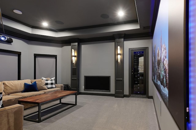 227 Starlight Pl, The Woodlands, TX 77380 - carpeted home theater room with a raised ceiling and ornamental molding