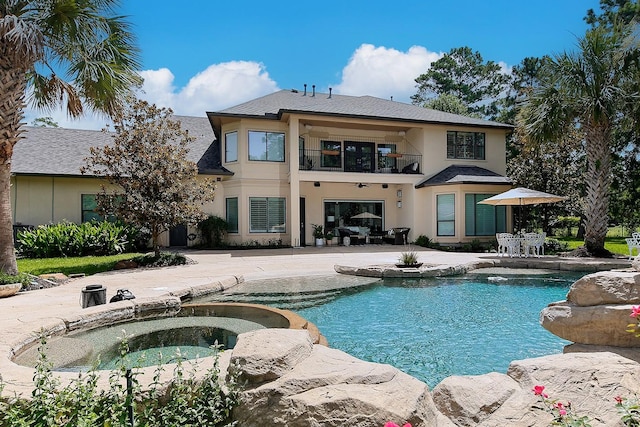 227 Starlight Pl, The Woodlands, TX 77380 - view of pool featuring a patio area and a pool with connected hot tub