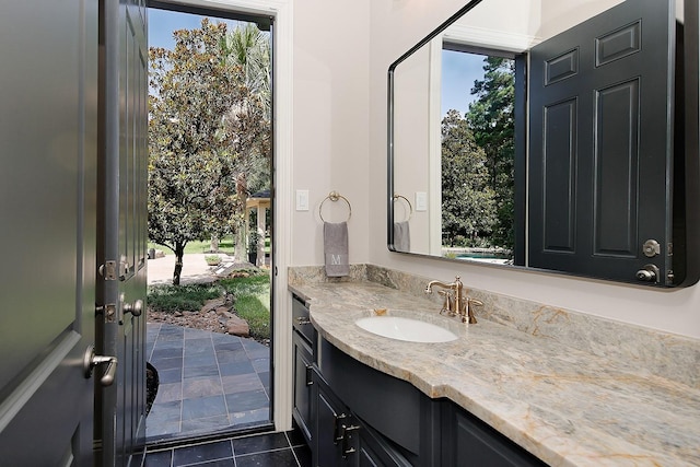 227 Starlight Pl, The Woodlands, TX 77380 - bathroom featuring vanity and tile patterned floors