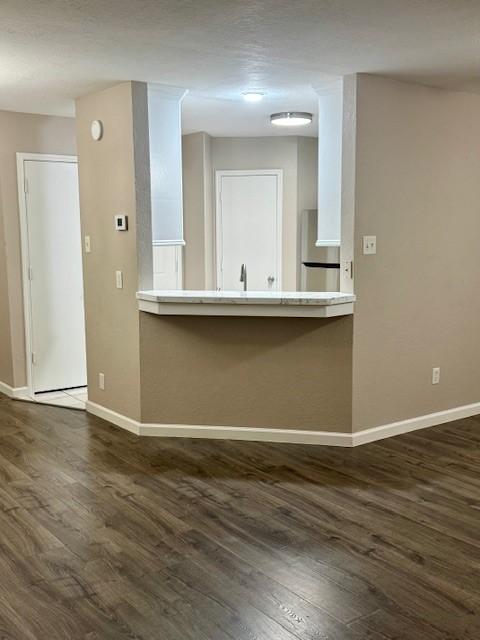 50 Evanston St Unit 5, Houston, TX 77015 - kitchen featuring refrigerator and wood finished floors