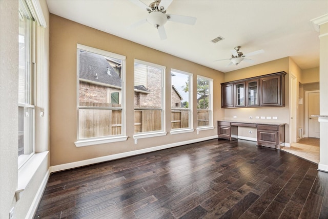 4503 Riley Way Ln, Sugar Land, TX 77479 - unfurnished sunroom featuring built in study area