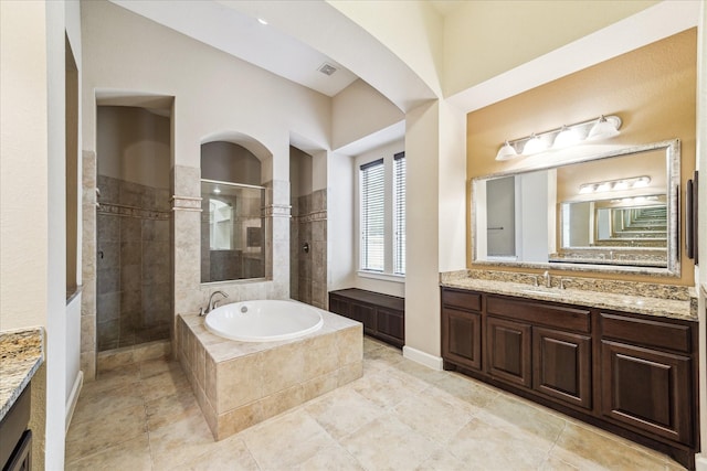 4503 Riley Way Ln, Sugar Land, TX 77479 - bathroom with vanity, a walk in shower, and a bath