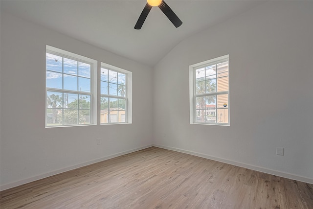 1014 13th St, Galveston, TX 77550 - unfurnished room with healthy amount of natural light, lofted ceiling, light wood-style floors, and a ceiling fan