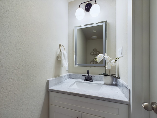 5022 Broom St, Houston, TX 77091 - bathroom featuring vanity and a textured wall