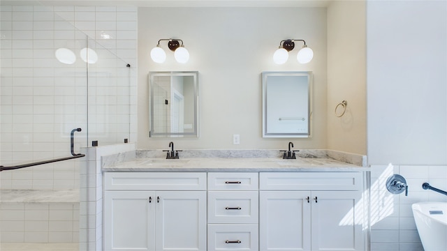 5022 Broom St, Houston, TX 77091 - full bathroom featuring a stall shower, a freestanding bath, double vanity, and a wainscoted wall