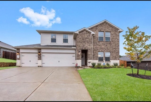 11577 Gingerland Dr, Conroe, TX 77304 - traditional home with driveway, brick siding, a garage, and stone siding