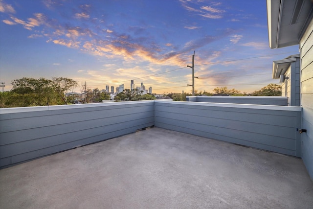 1805 Mills St, Houston, TX 77026 - patio terrace at dusk featuring a city view and a patio area