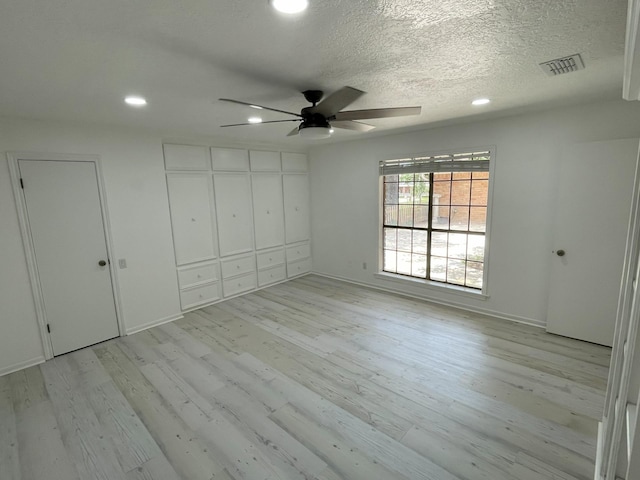 3419 Willowrun Dr, Montgomery, TX 77356 - unfurnished bedroom with recessed lighting, light wood finished floors, a textured ceiling, and ceiling fan