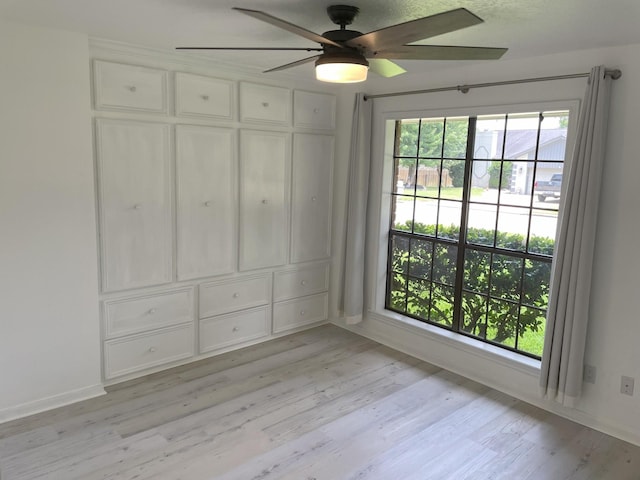 3419 Willowrun Dr, Montgomery, TX 77356 - unfurnished room featuring a ceiling fan and light wood finished floors
