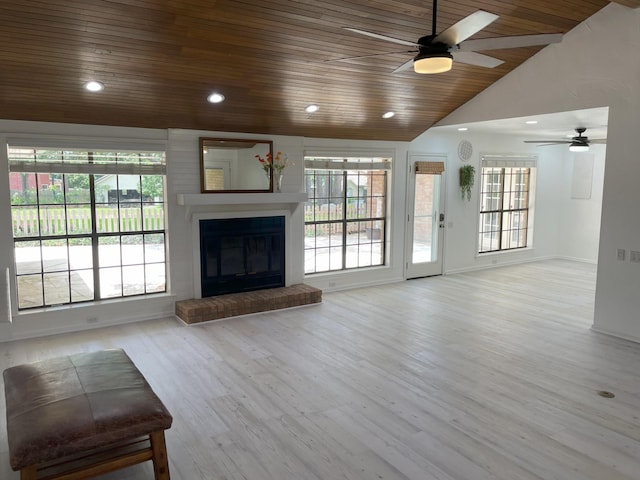 3419 Willowrun Dr, Montgomery, TX 77356 - unfurnished living room with ceiling fan, wooden ceiling, a fireplace, vaulted ceiling, and wood finished floors