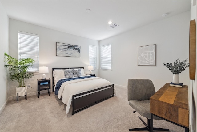 1804 Elysian St, Houston, TX 77026 - bedroom with baseboards and light colored carpet