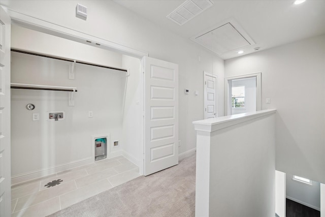 1812 Elysian St, Houston, TX 77026 - laundry room with attic access, hookup for a washing machine, recessed lighting, light tile patterned floors, and light carpet