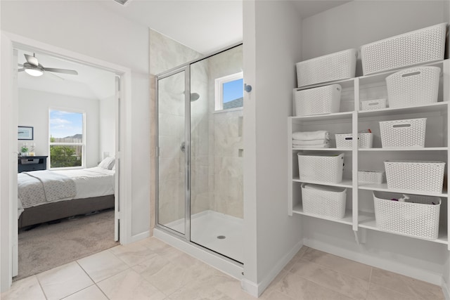 8814 Riverton Ridge Rd, Cypress, TX 77433 - ensuite bathroom featuring healthy amount of natural light, a shower stall, and ceiling fan