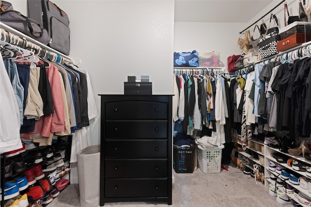 8814 Riverton Ridge Rd, Cypress, TX 77433 - walk in closet with carpet flooring
