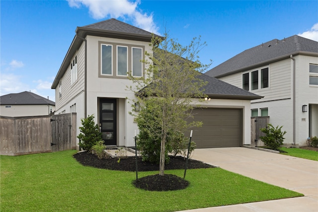 8814 Riverton Ridge Rd, Cypress, TX 77433 - view of front facade featuring driveway, a garage, stucco siding, and roof with shingles