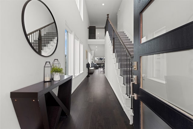 8814 Riverton Ridge Rd, Cypress, TX 77433 - foyer with a towering ceiling, stairway, and dark wood finished floors