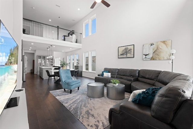 8814 Riverton Ridge Rd, Cypress, TX 77433 - living room with a ceiling fan, dark wood-style floors, a towering ceiling, and recessed lighting
