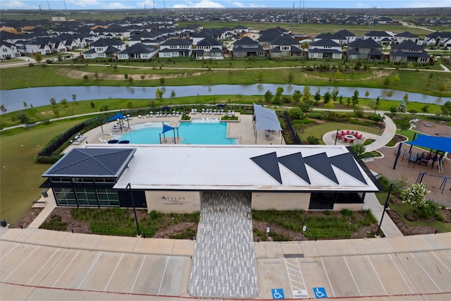 8814 Riverton Ridge Rd, Cypress, TX 77433 - aerial perspective of suburban area with a nearby body of water