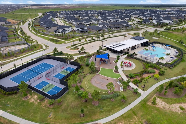 8814 Riverton Ridge Rd, Cypress, TX 77433 - aerial overview of property's location with a pool and nearby suburban area