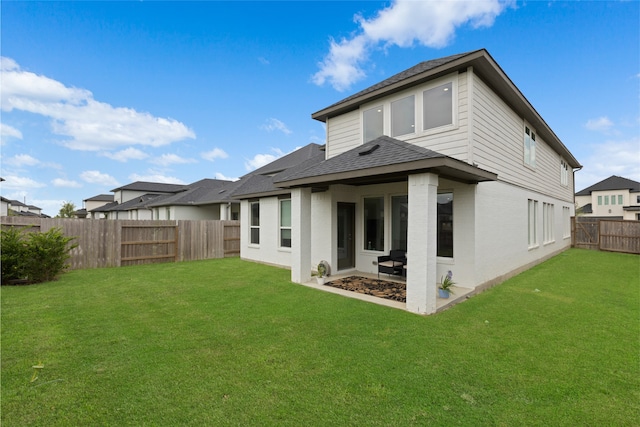 8814 Riverton Ridge Rd, Cypress, TX 77433 - back of house featuring a shingled roof and a fenced backyard