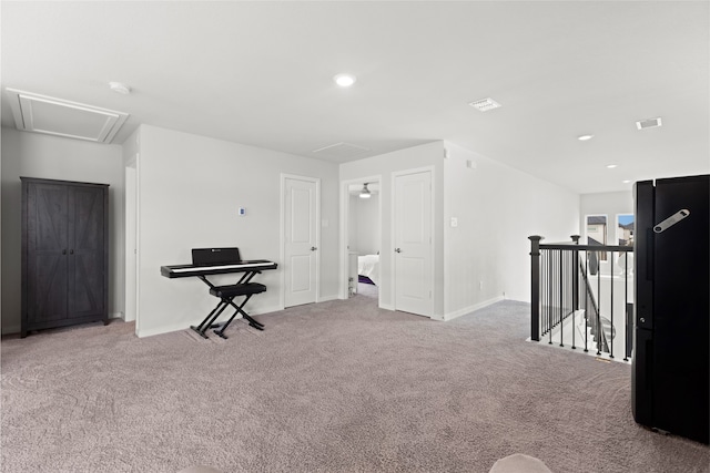 8814 Riverton Ridge Rd, Cypress, TX 77433 - unfurnished room featuring attic access, carpet floors, an upstairs landing, and recessed lighting