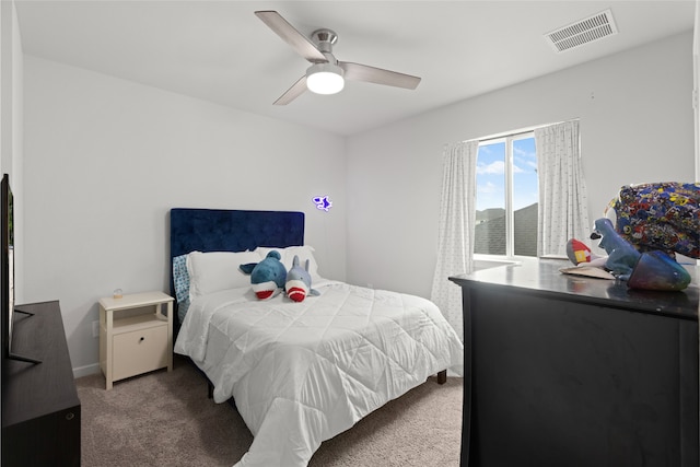 8814 Riverton Ridge Rd, Cypress, TX 77433 - bedroom with carpet floors and ceiling fan