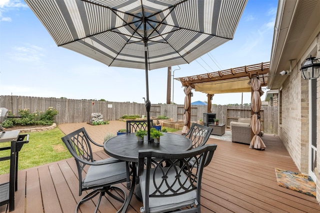 19919 Epirus Shores Dr, Hockley, TX 77447 - wooden deck featuring a pergola, a fenced backyard, and outdoor dining space