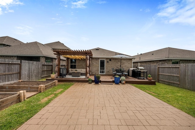 19919 Epirus Shores Dr, Hockley, TX 77447 - rear view of property featuring a pergola, a wooden deck, a vegetable garden, an outdoor living space, and a fenced backyard