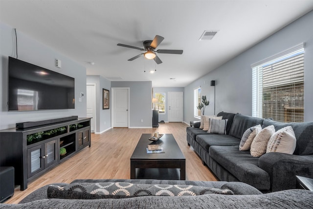 19919 Epirus Shores Dr, Hockley, TX 77447 - living room with light wood-style flooring and ceiling fan