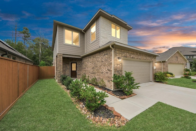 12306 Belhaven Terrace Dr, Houston, TX 77044 - view of front facade with brick siding, concrete driveway, and a garage