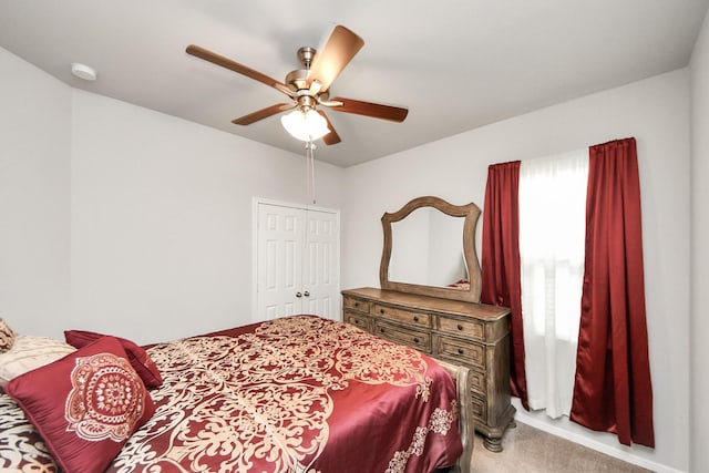 12306 Belhaven Terrace Dr, Houston, TX 77044 - carpeted bedroom with a closet and ceiling fan
