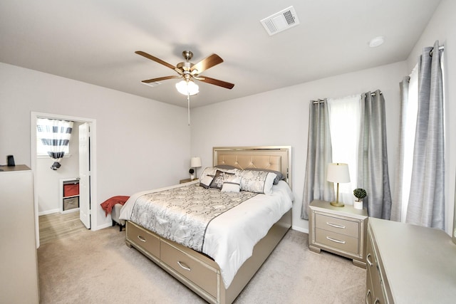 12306 Belhaven Terrace Dr, Houston, TX 77044 - bedroom with light colored carpet and ceiling fan