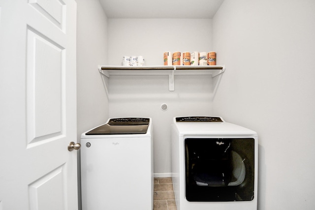 12306 Belhaven Terrace Dr, Houston, TX 77044 - laundry room with washer and clothes dryer