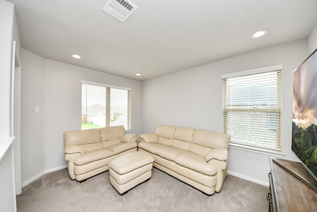 12306 Belhaven Terrace Dr, Houston, TX 77044 - carpeted living room with recessed lighting and healthy amount of natural light