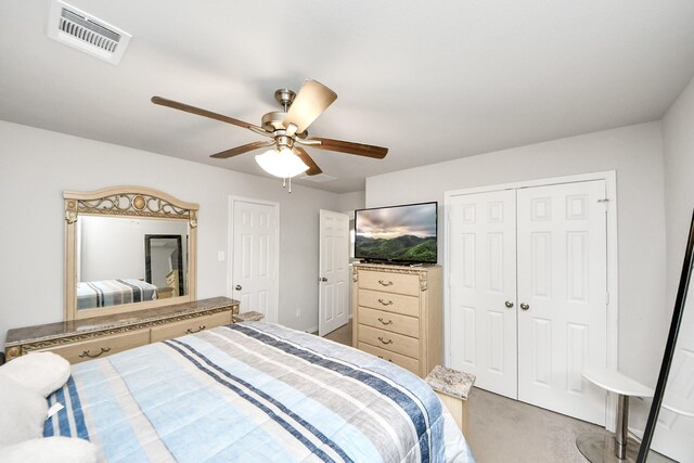 12306 Belhaven Terrace Dr, Houston, TX 77044 - bedroom featuring light carpet, a closet, and a ceiling fan