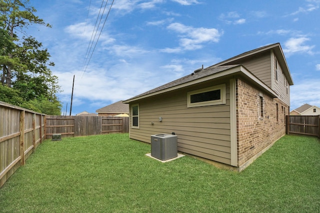 12306 Belhaven Terrace Dr, Houston, TX 77044 - rear view of property featuring brick siding and a fenced backyard