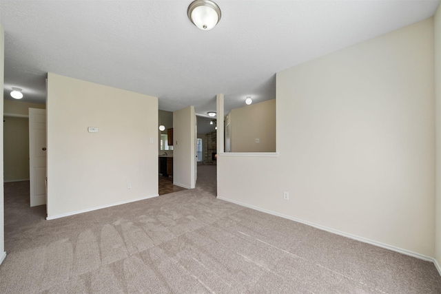 11423 Sunny Creek Dr, Houston, TX 77066 - unfurnished living room with carpet and baseboards