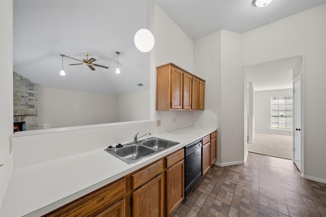 11423 Sunny Creek Dr, Houston, TX 77066 - kitchen featuring dishwasher, vaulted ceiling, light countertops, a fireplace, and brick patterned floors