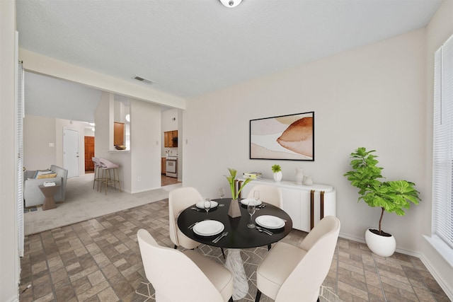 11423 Sunny Creek Dr, Houston, TX 77066 - dining room with brick patterned flooring and baseboards