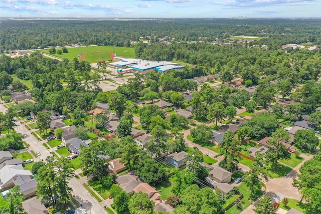 11423 Sunny Creek Dr, Houston, TX 77066 - aerial overview of property's location featuring a heavily wooded area and nearby suburban area