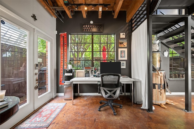 2614 Yoakum Blvd, Houston, TX 77006 - office space featuring healthy amount of natural light, french doors, and concrete flooring