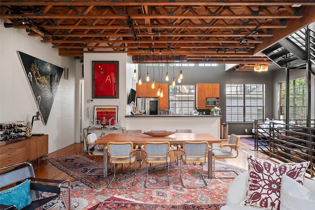 2614 Yoakum Blvd, Houston, TX 77006 - dining area with wood-type flooring and healthy amount of natural light