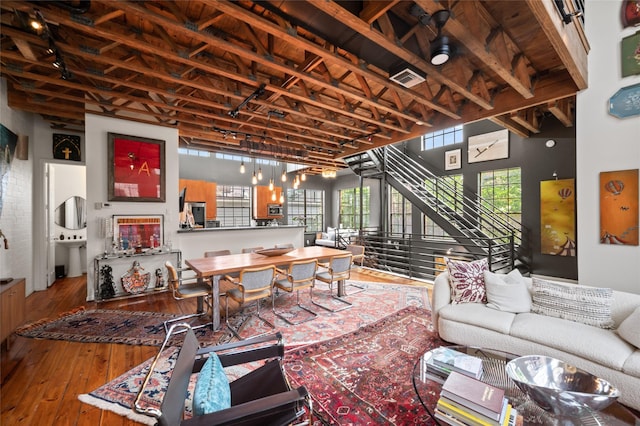 2614 Yoakum Blvd, Houston, TX 77006 - living area with hardwood / wood-style flooring and stairway